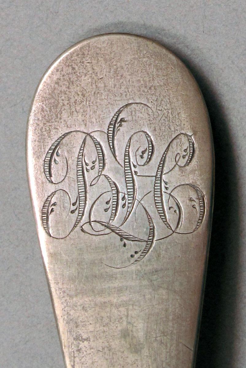 1962.0240.1491 Silver spoon engraving