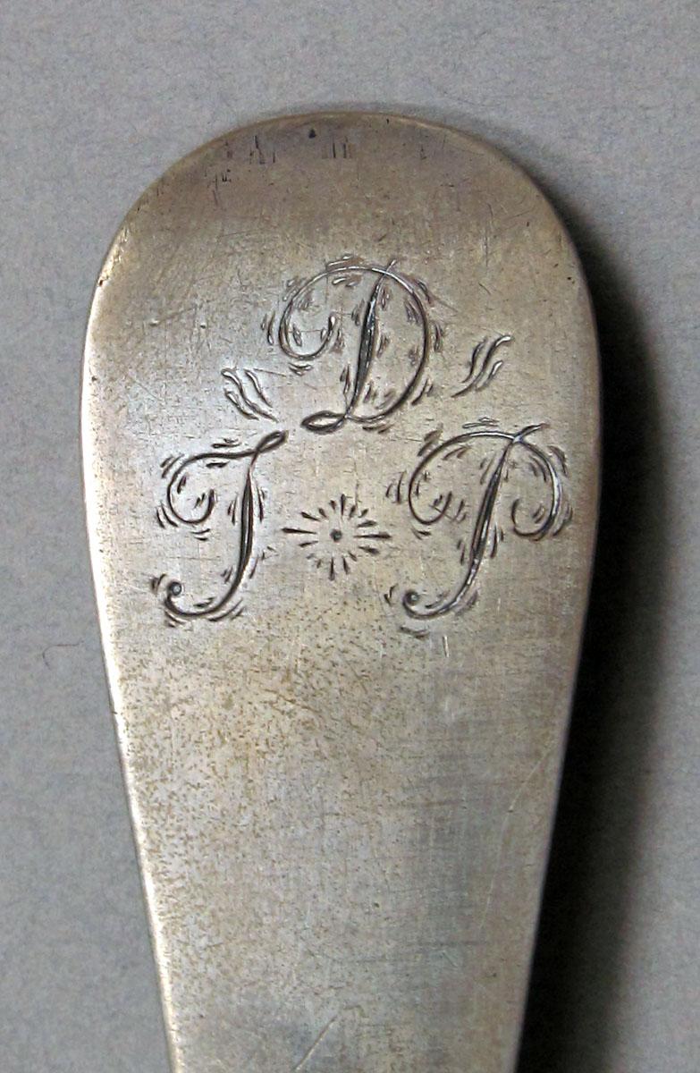 1962.0240.1497 Silver spoon engraving