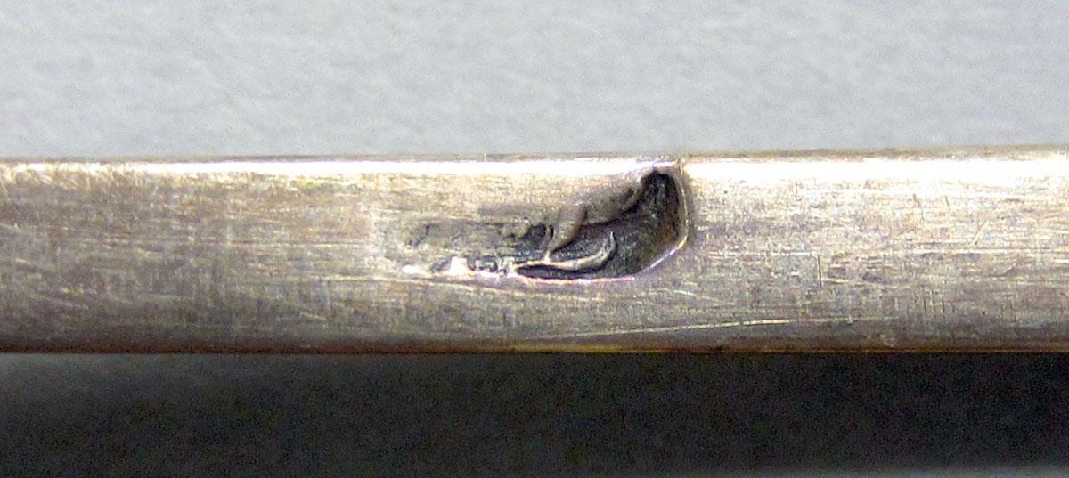 1962.0240.149 teaspoon mark