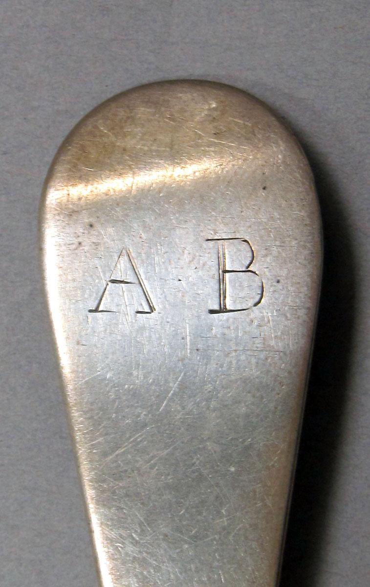1962.0240.1506 Silver spoon engraving