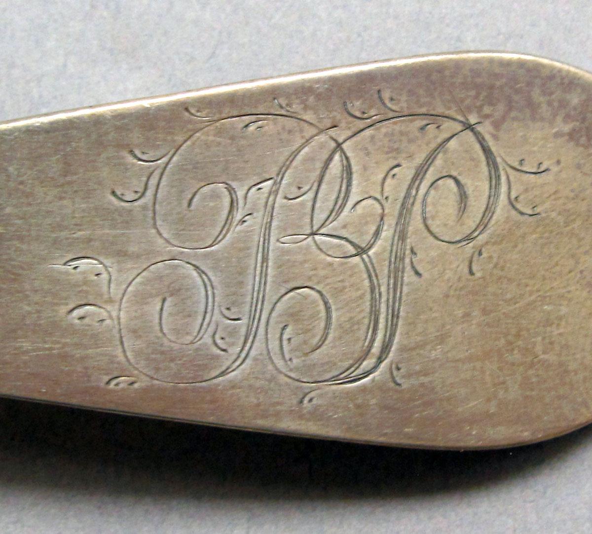 1962.0240.1508 Silver spoon engraving