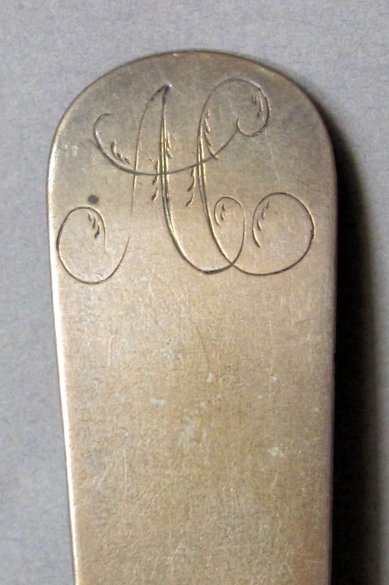 1962.0240.1514 Silver spoon engraving