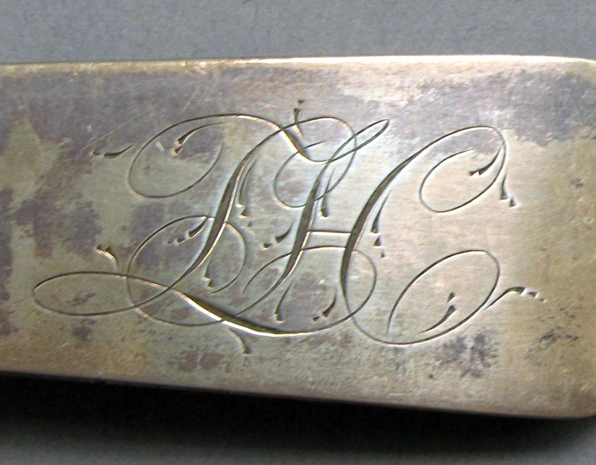 1962.0240.1516 Silver spoon engraving