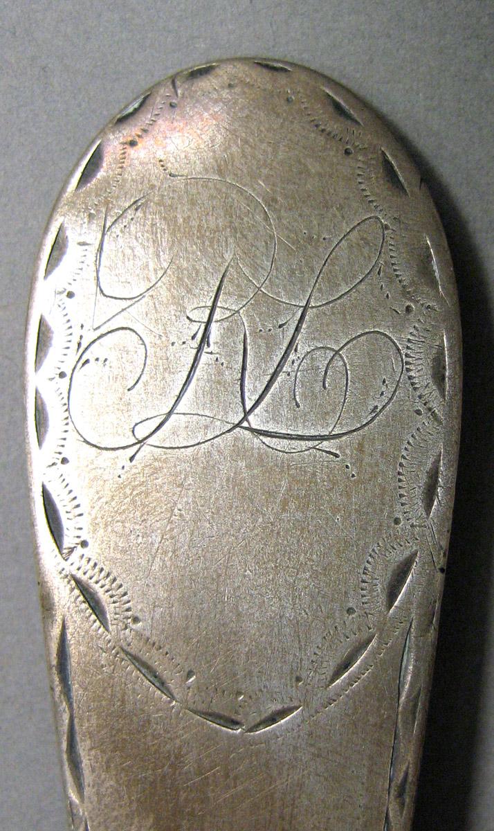 1962.0240.1581 Silver Spoon engraving