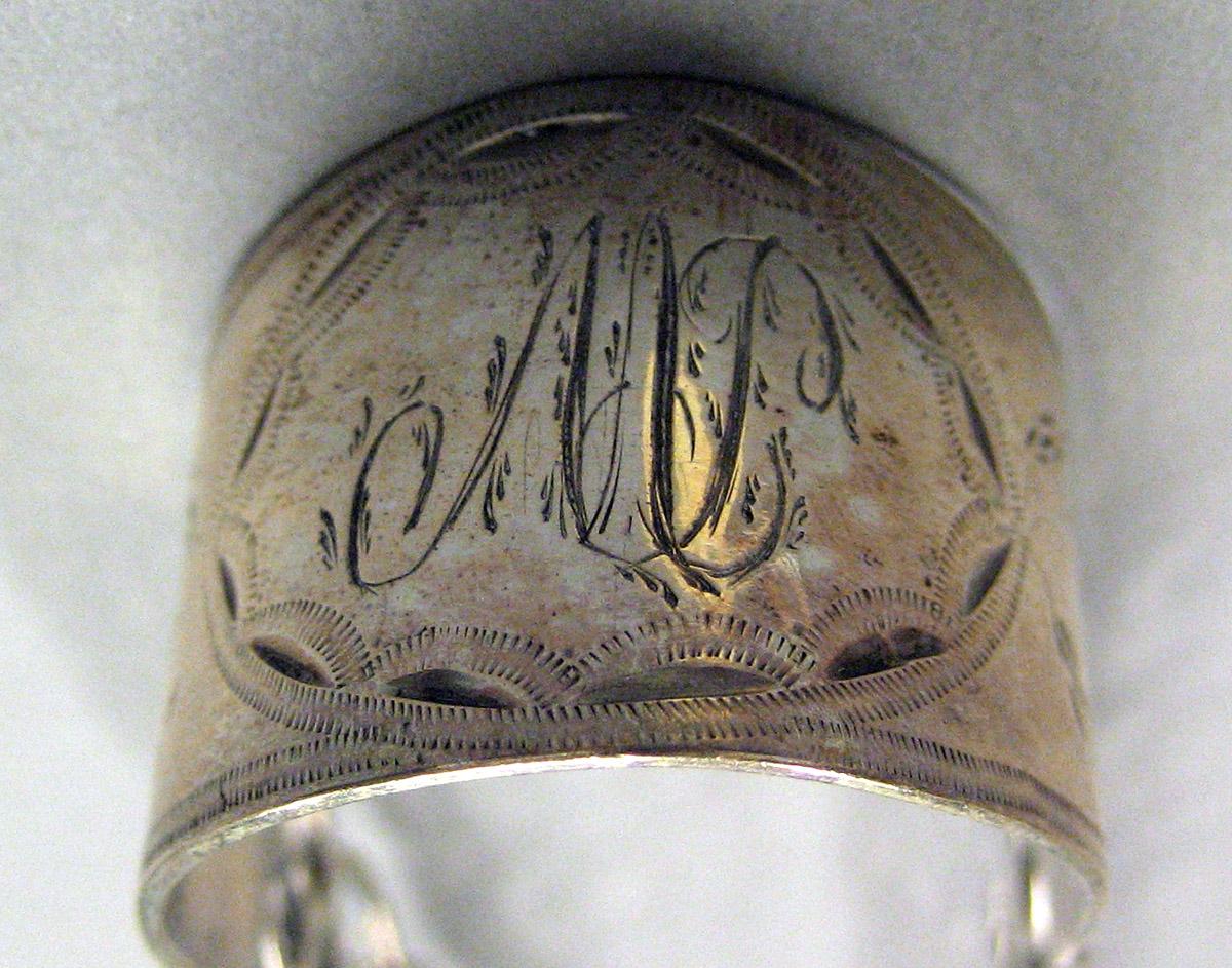 1962.0240.1617 Silver Tongs engraving