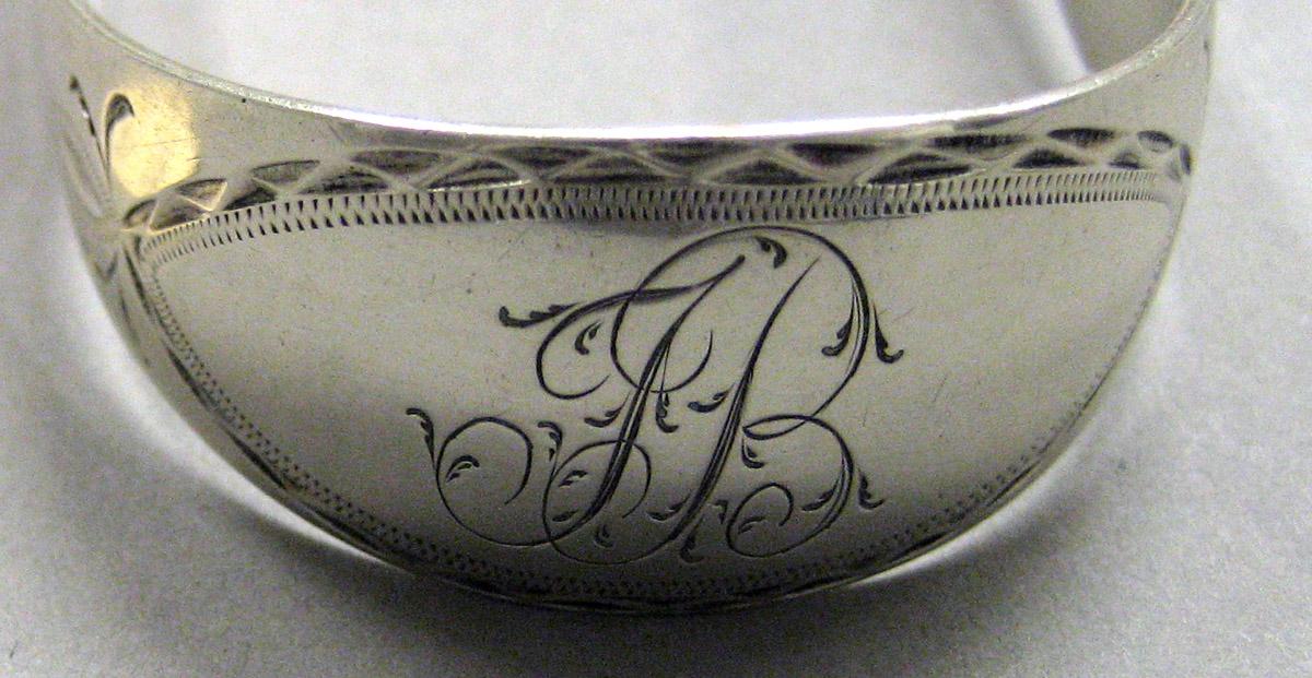 1962.0240.1622 Silver Tongs engraving