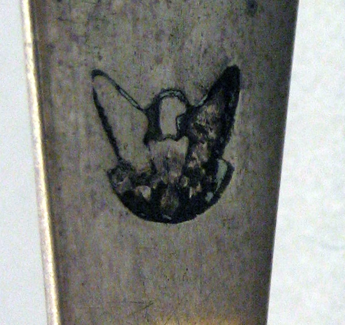 1962.0240.1630 Silver Tongs mark 2