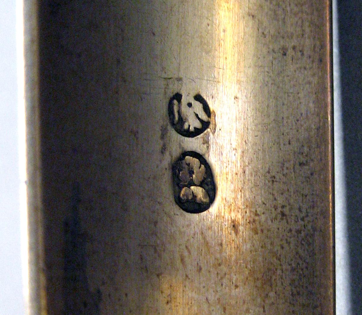 1962.0240.1631 Silver Tongs mark 1