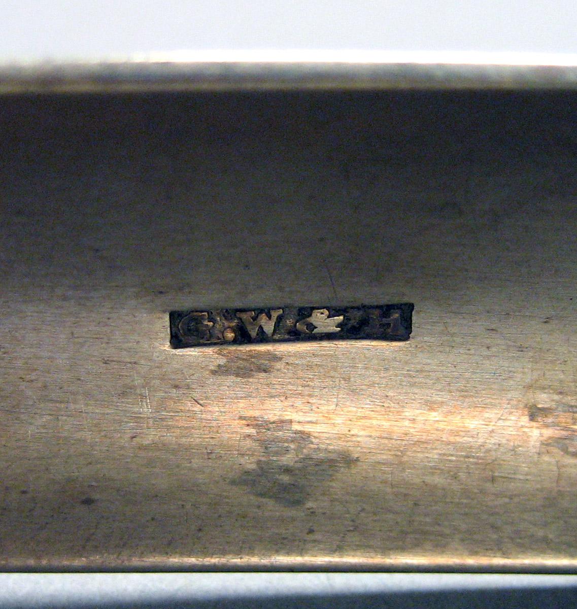 1962.0240.1631 Silver Tongs mark 2