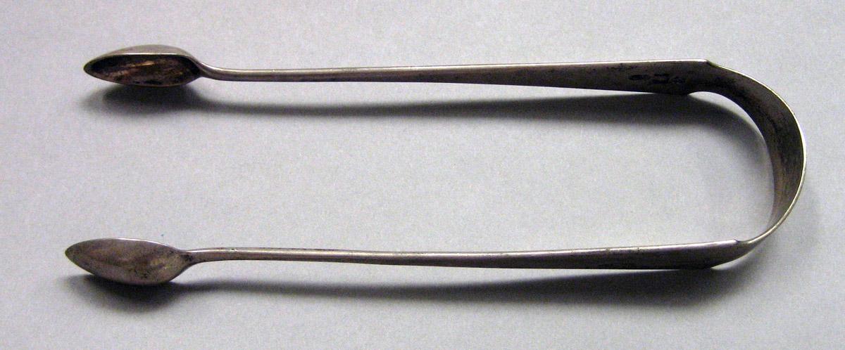 1962.0240.1632 Silver Tongs view 1