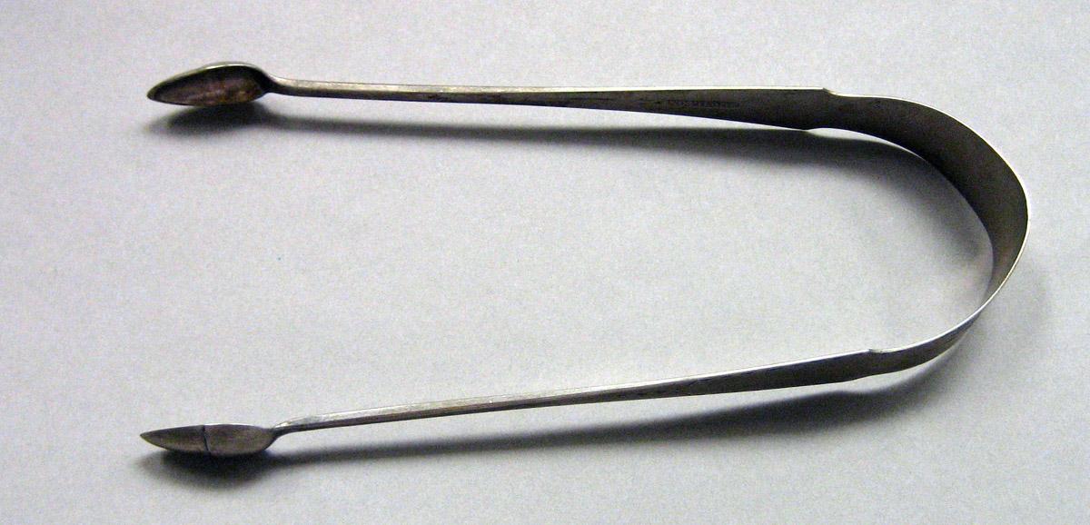 1962.0240.1636 Silver Tongs view 1