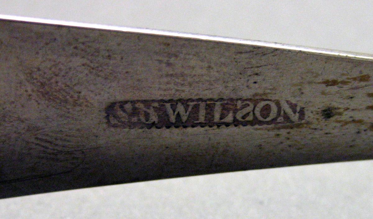 1962.0240.1636 Silver Tongs mark 1