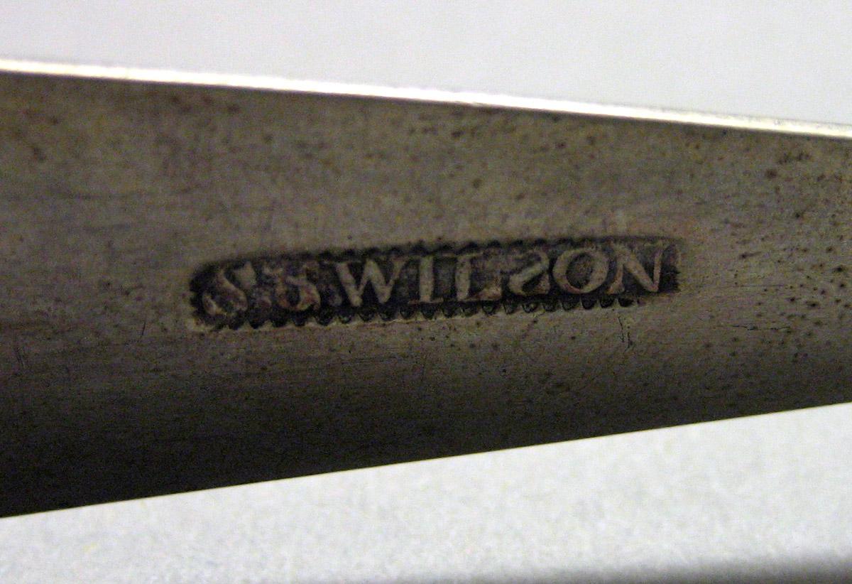 1962.0240.1636 Silver Tongs mark 2