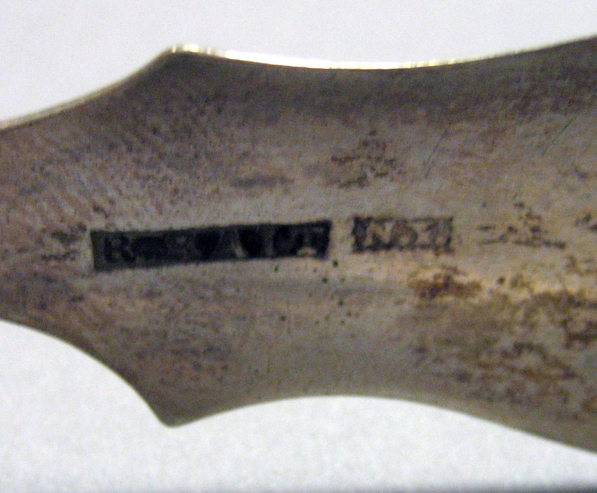 1962.0240.1637 Silver Tongs mark 2
