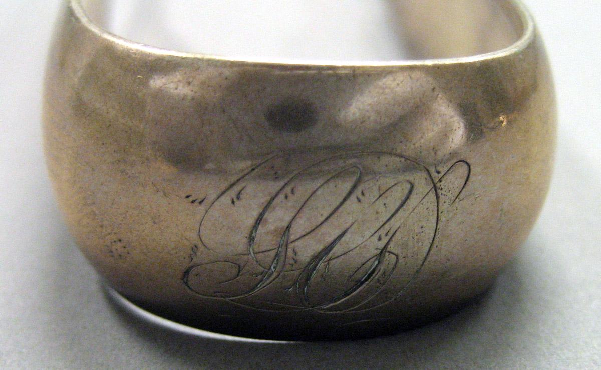 1962.0240.1640 Silver Tongs engraving