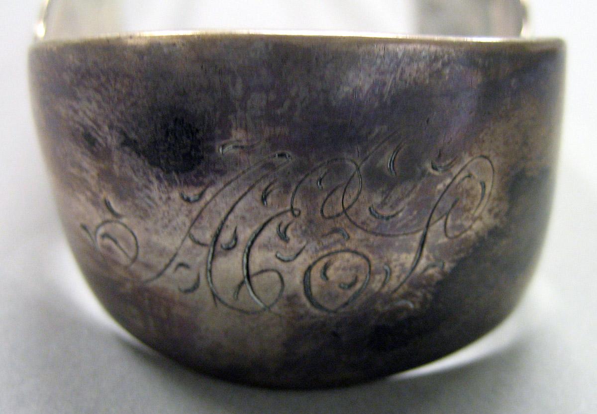 1962.0240.1645 Silver Tongs engraving