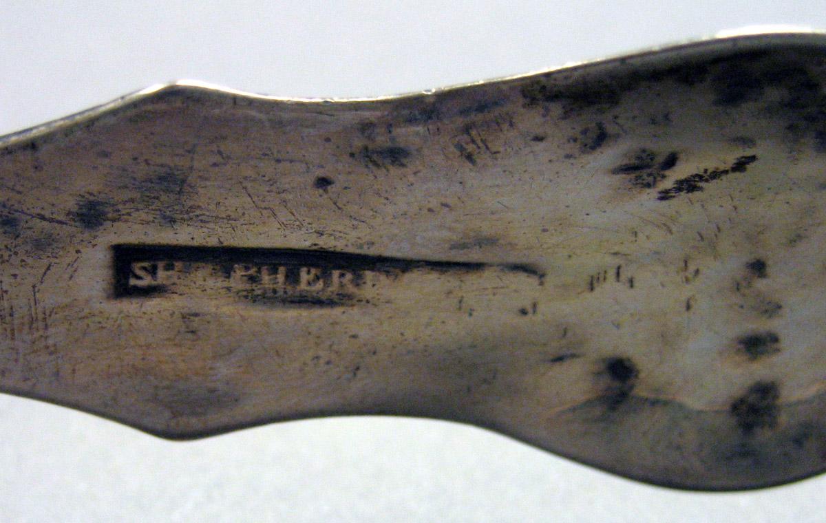 1962.0240.1646 Silver Tongs mark