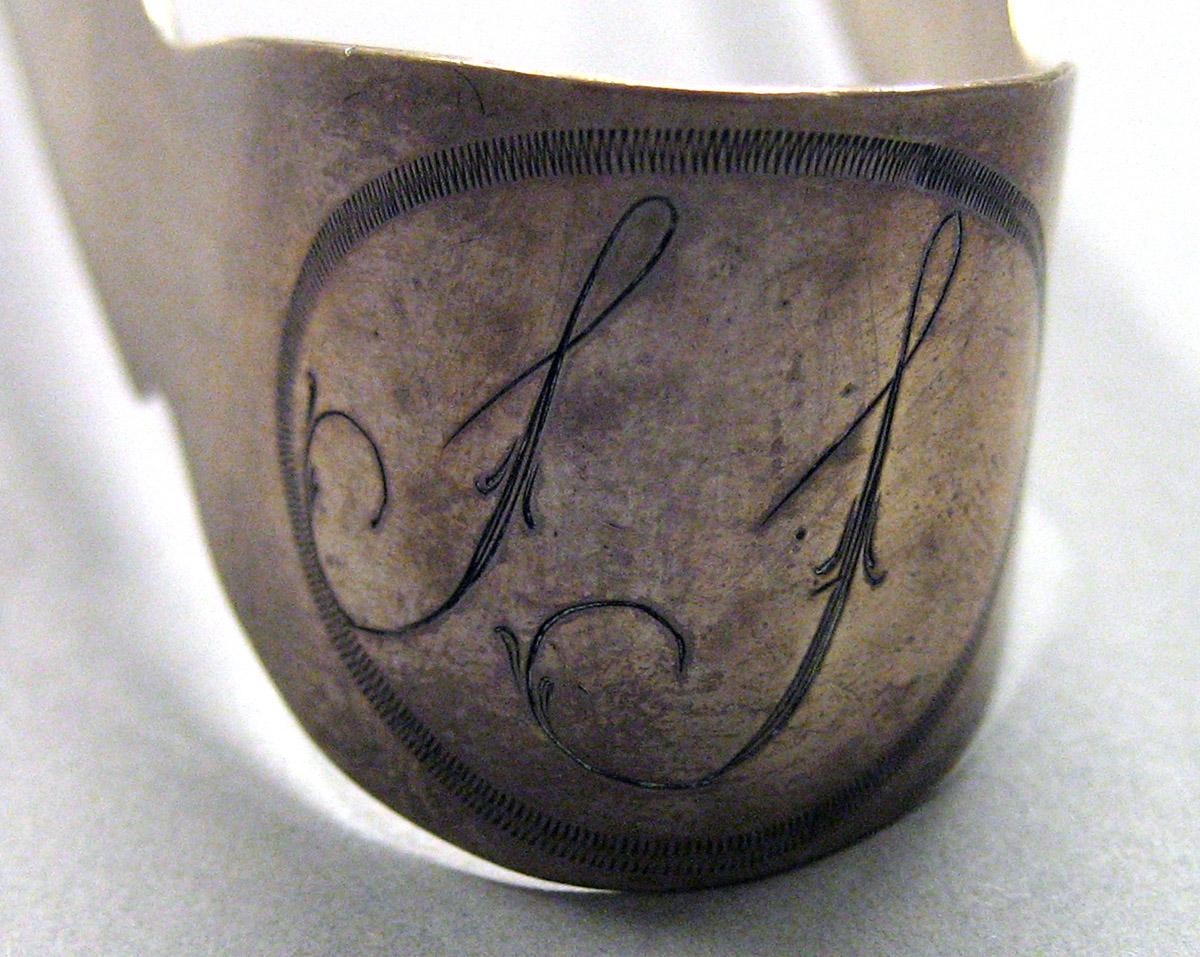 1962.0240.1647 Silver Tongs engraving