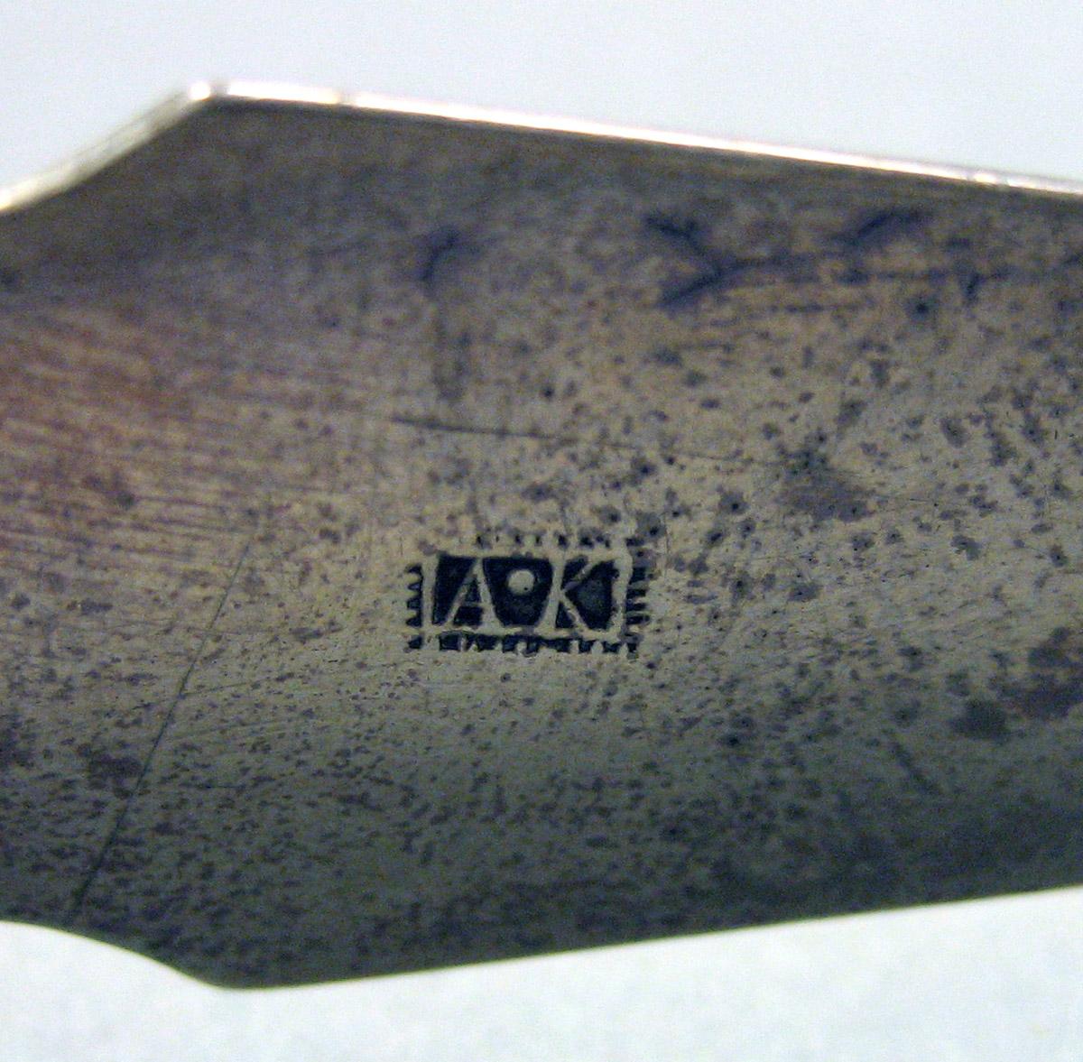 1962.0240.1647 Silver Tongs mark 2