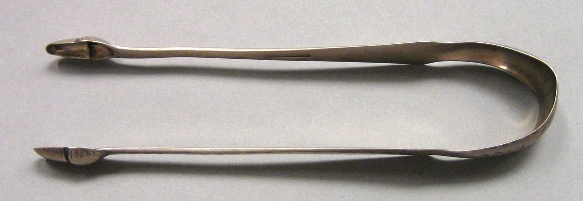 1962.0240.1653 Silver Tongs view 1
