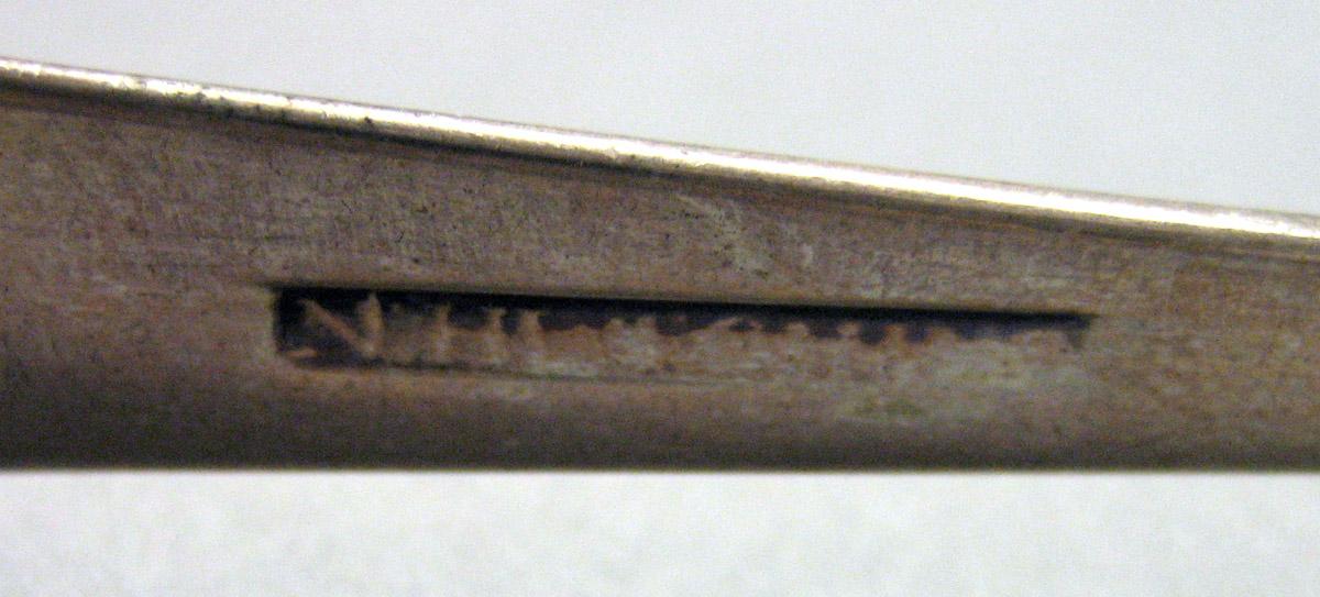 1962.0240.1653 Silver Tongs mark 1