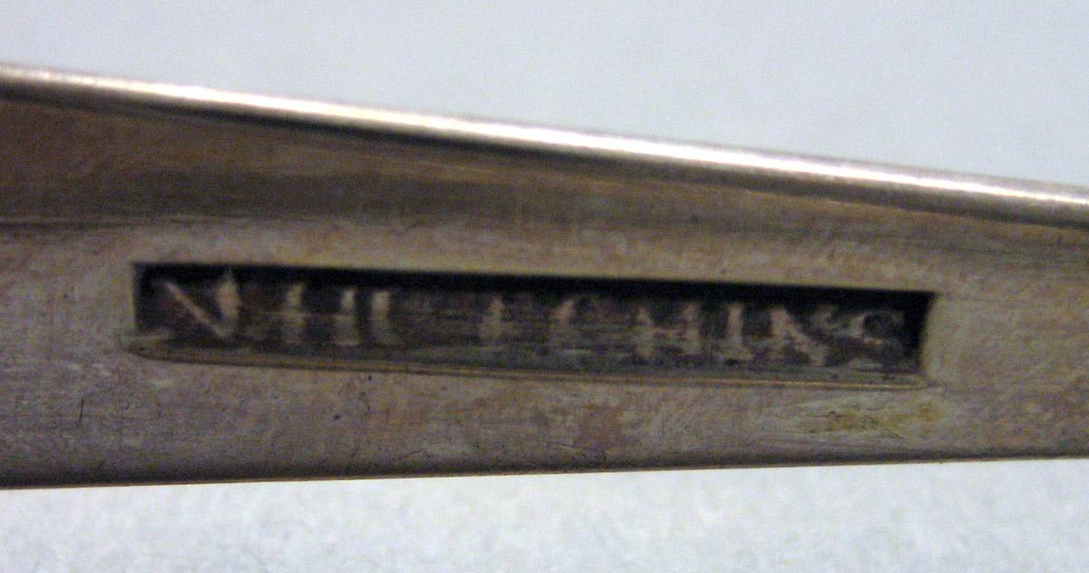 1962.0240.1653 Silver Tongs mark 2