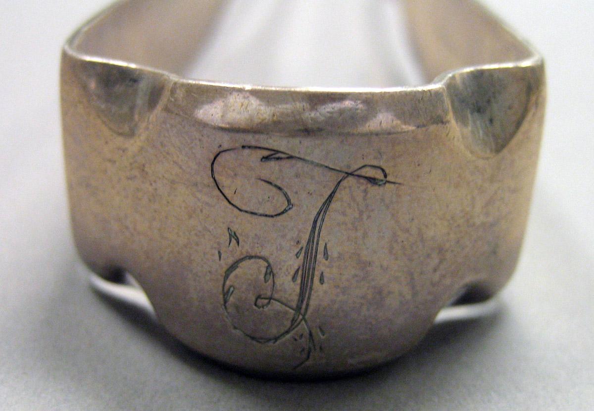 1962.0240.1654 Silver Tongs engraving