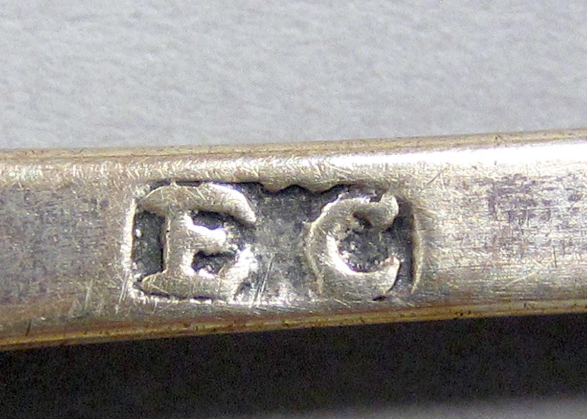1962.0240.174 teaspoon mark