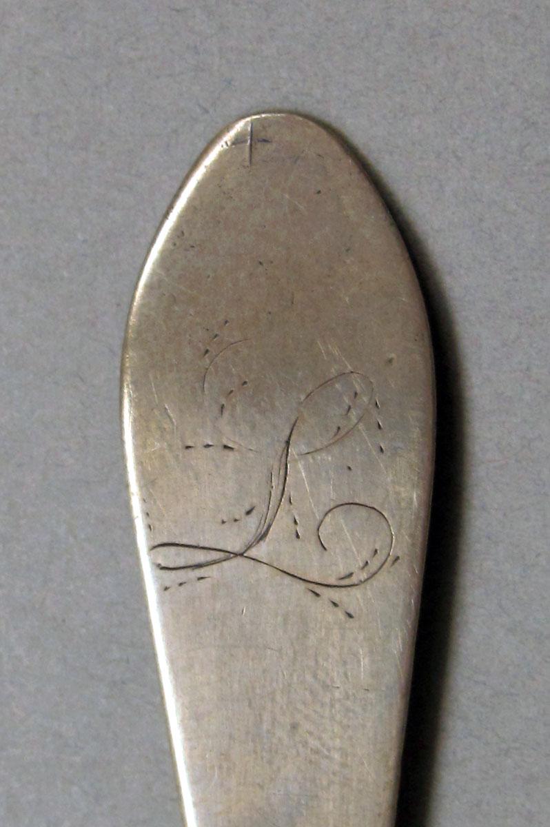 1962.0240.198 Silver spoon engraving
