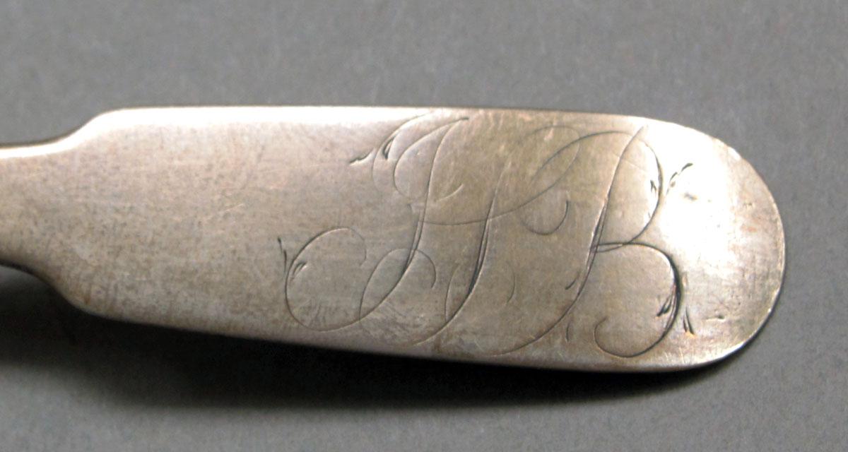 1962.0240.199 Silver spoon engraving