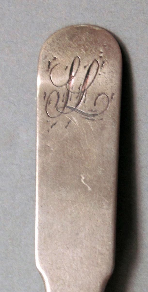 1962.0240.201 Silver spoon engraving