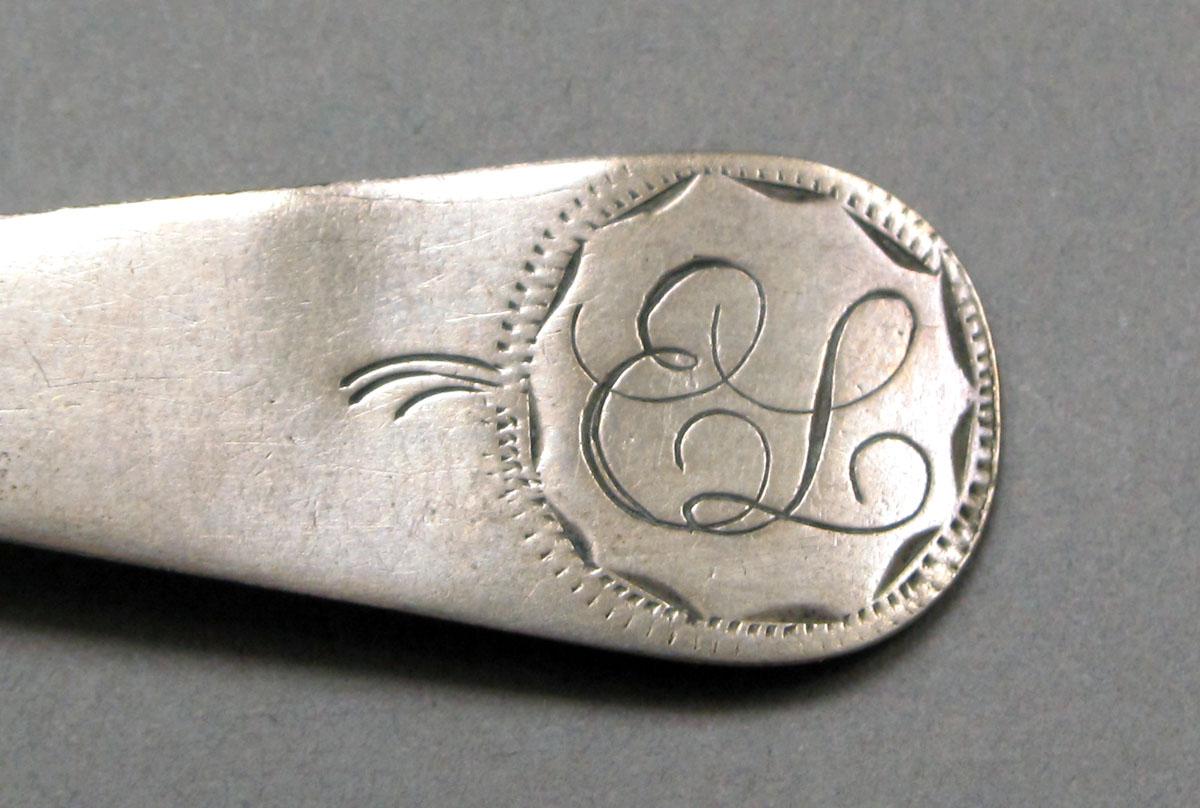 1962.0240.206 Silver spoon engraving