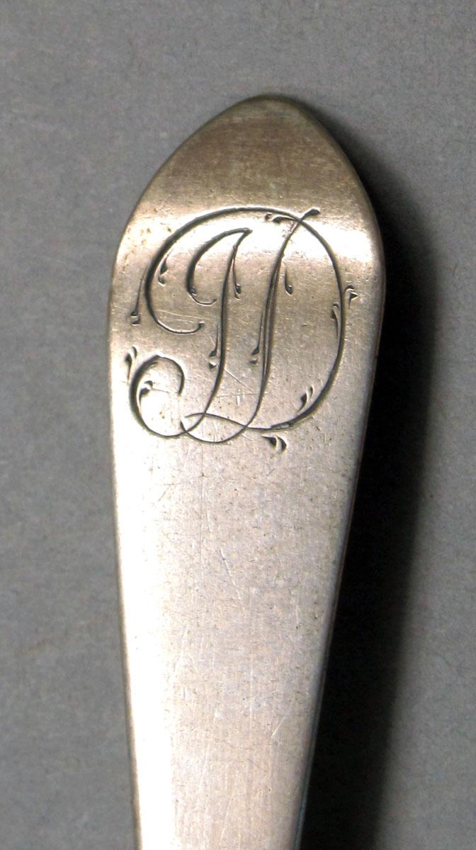 1962.0240.211 Silver spoon engraving
