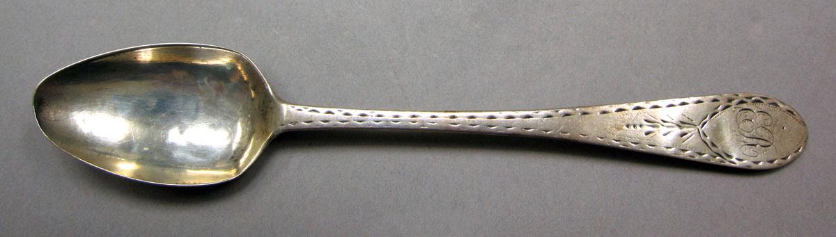 1962.0240.214 Silver spoon upper surface