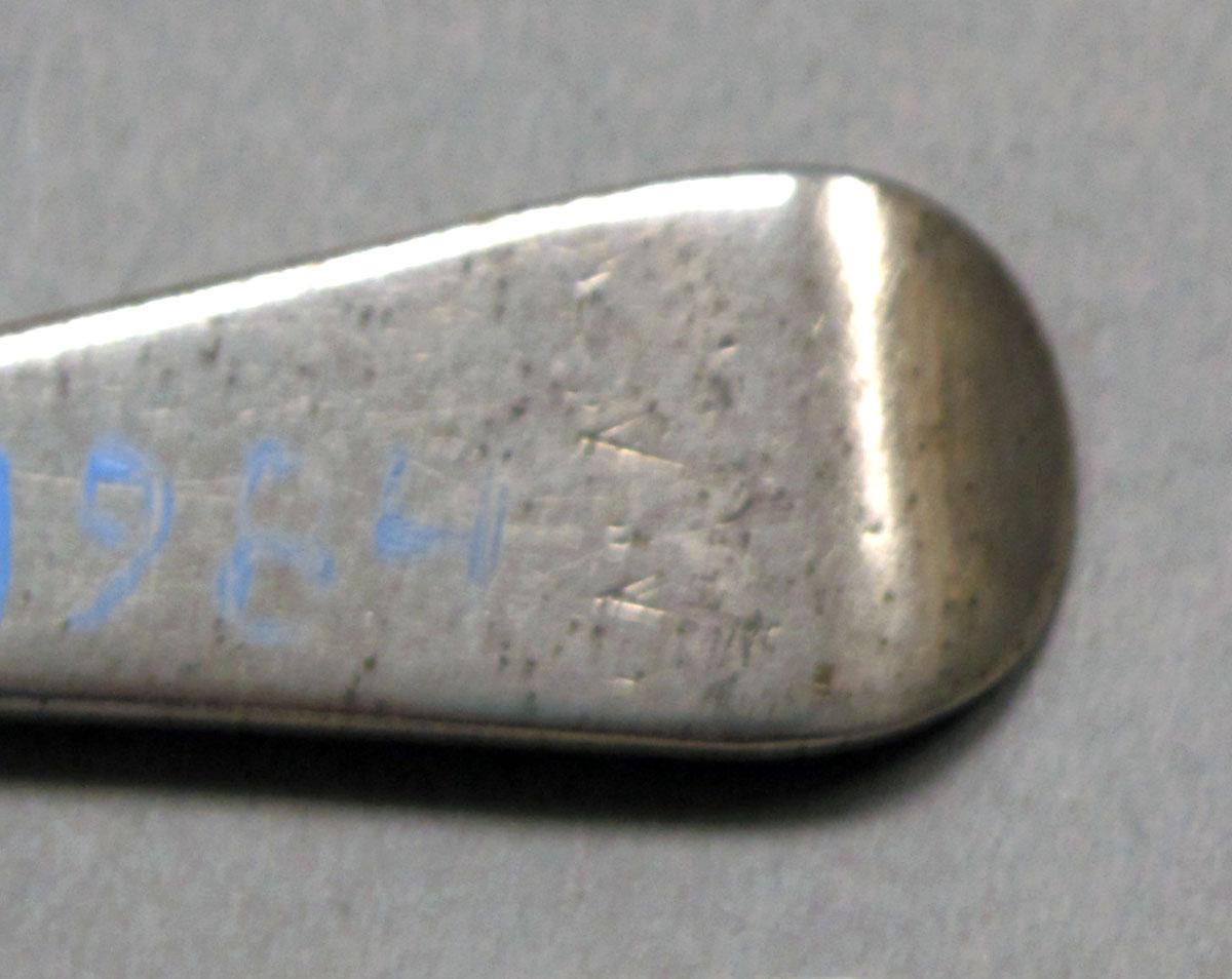 1962.0240.215 Silver spoon engraving