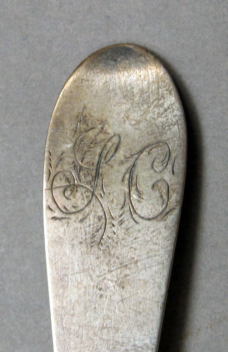 1962.0240.217 Silver spoon engraving