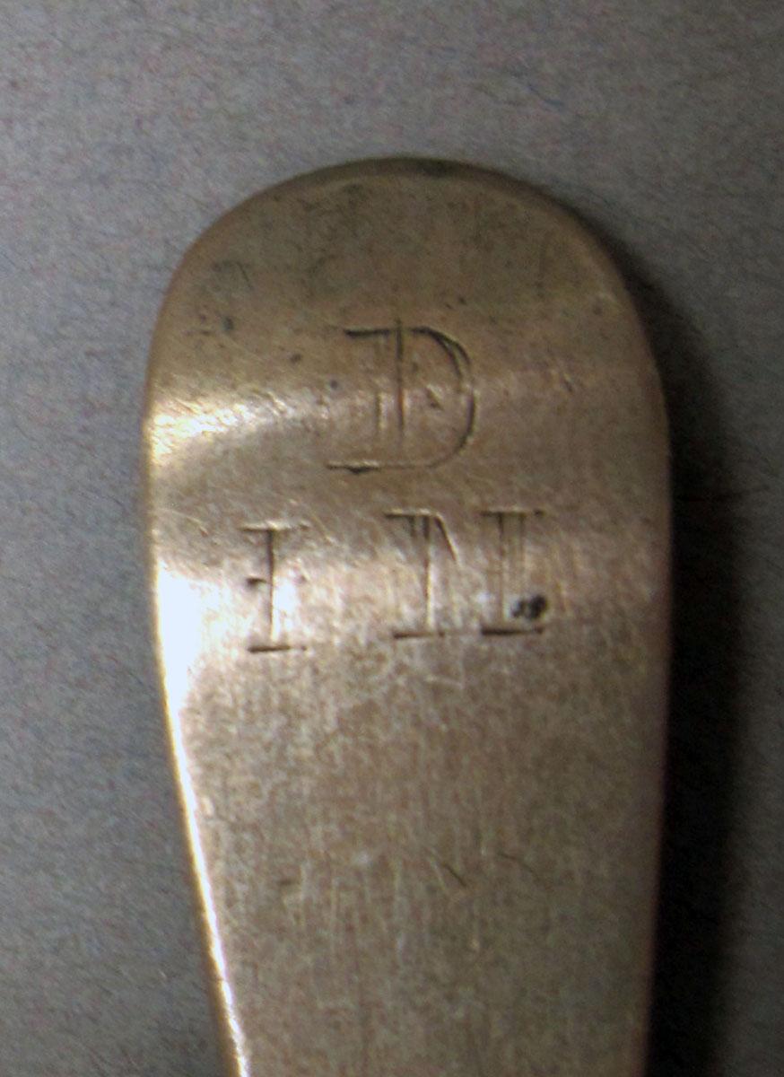 1962.0240.218 Silver spoon engraving