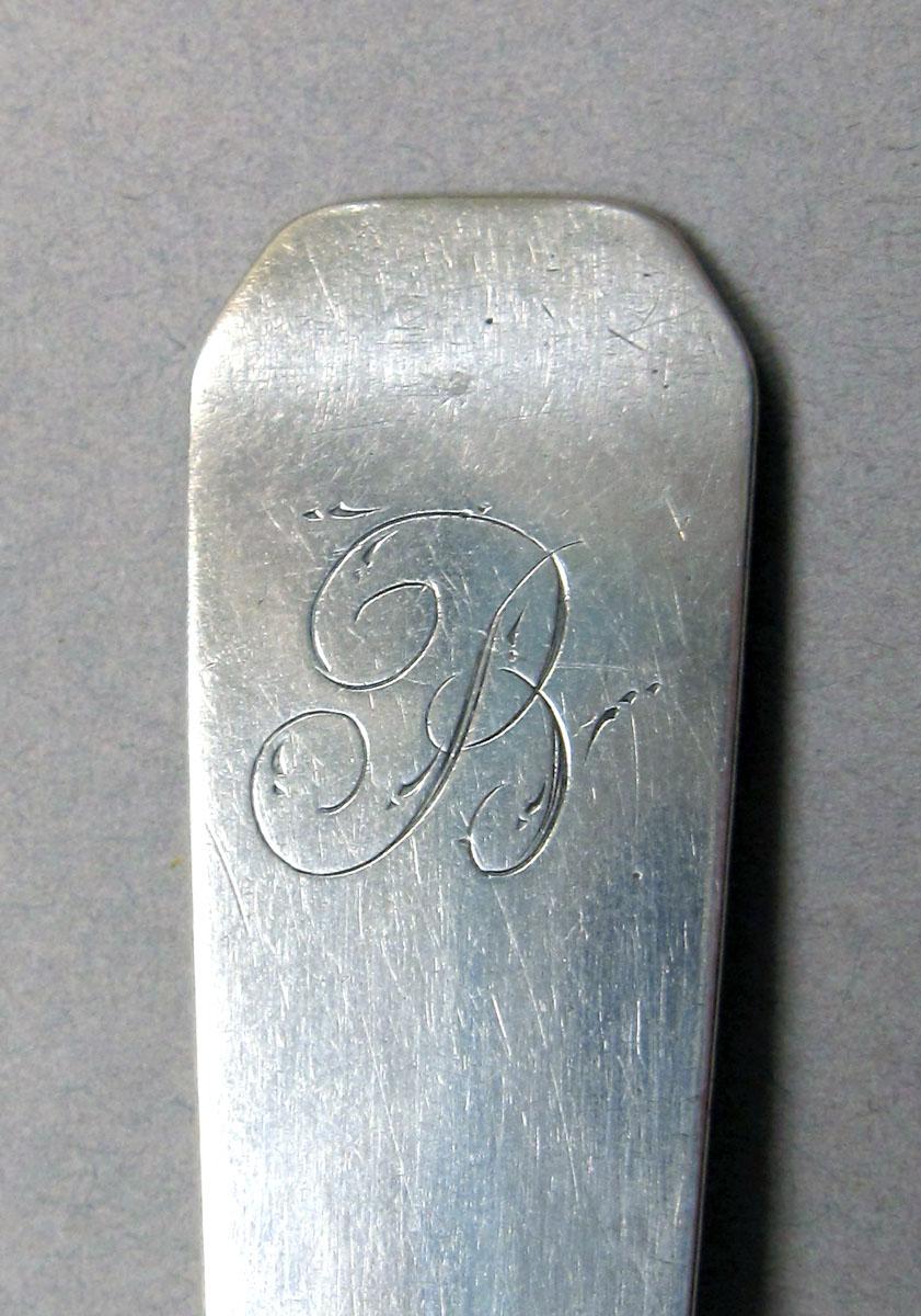 1962.0240.219 Silver spoon engraving