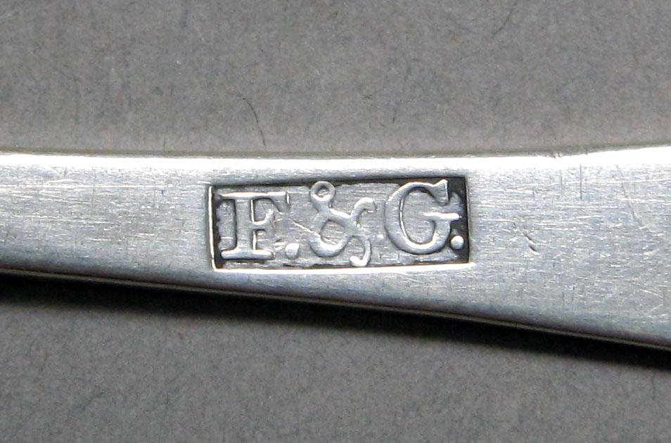 1962.0240.219 Silver spoon mark