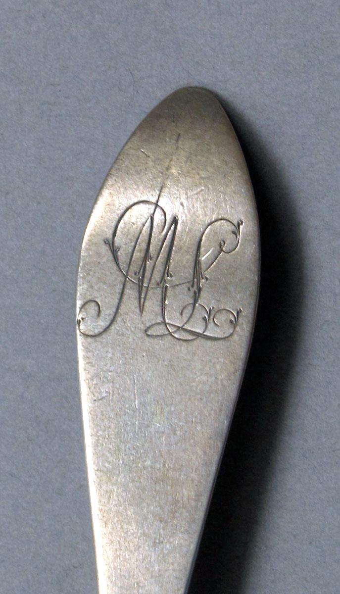 1962.0240.221 Silver spoon engraving