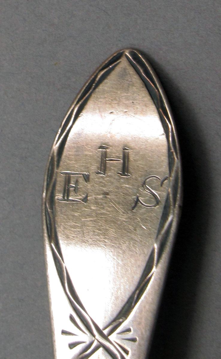 1962.0240.224 Silver spoon engraving