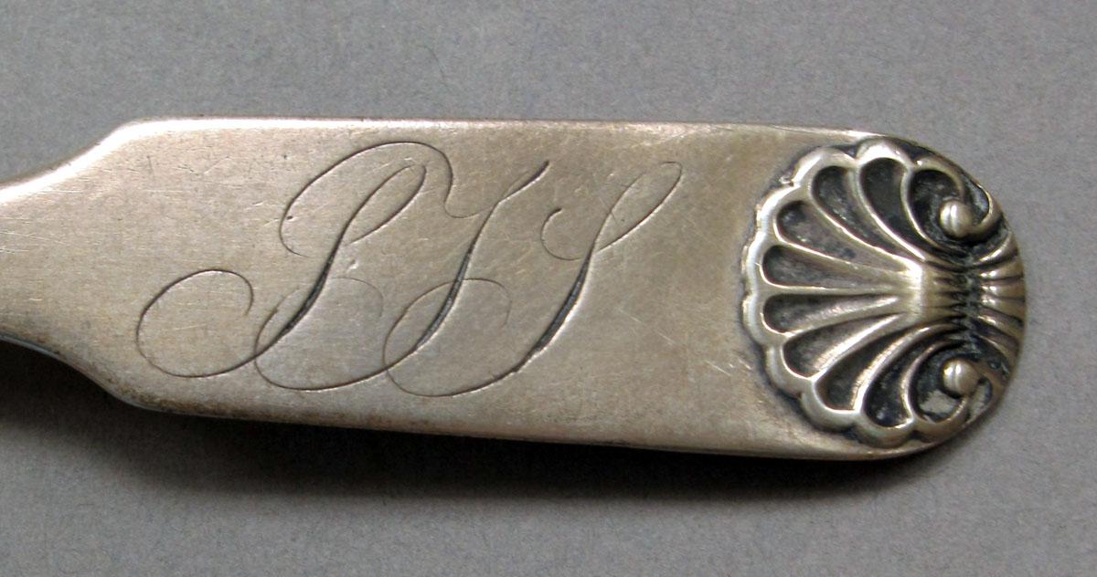 1962.0240.225 Silver spoon engraving