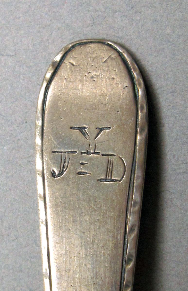 1962.0240.228 Silver spoon engraving