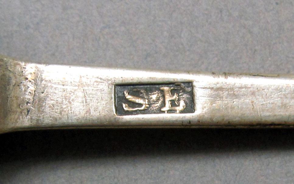 1962.0240.228 Silver spoon mark