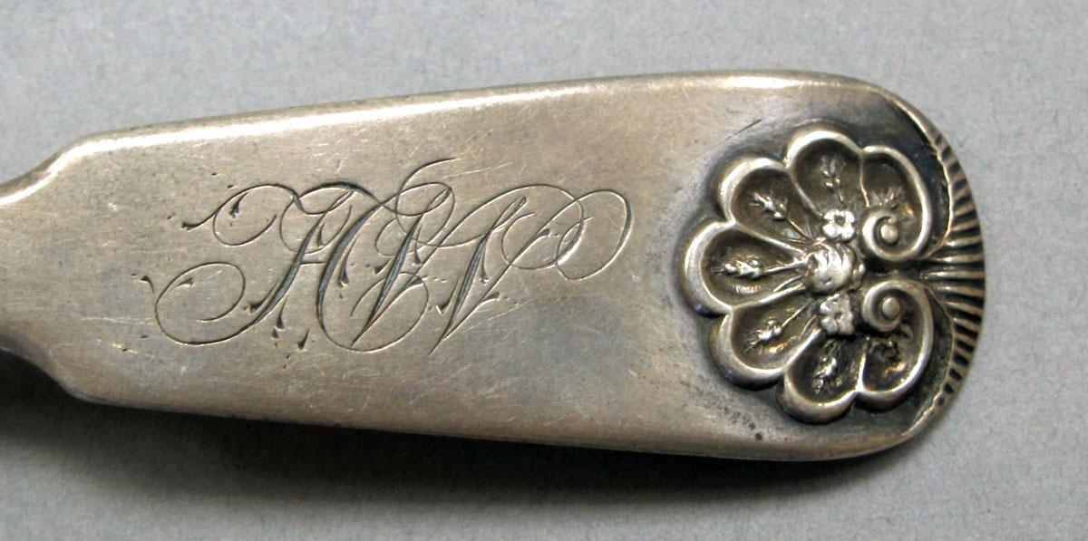 1962.0240.229 Silver spoon engraving