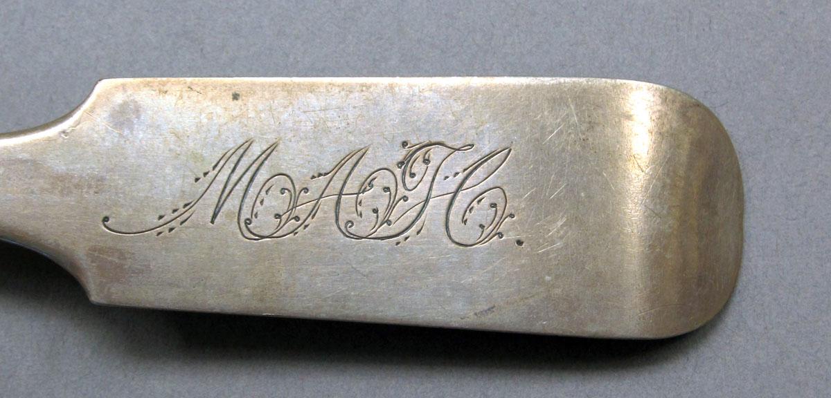 1962.0240.230 Silver spoon engraving