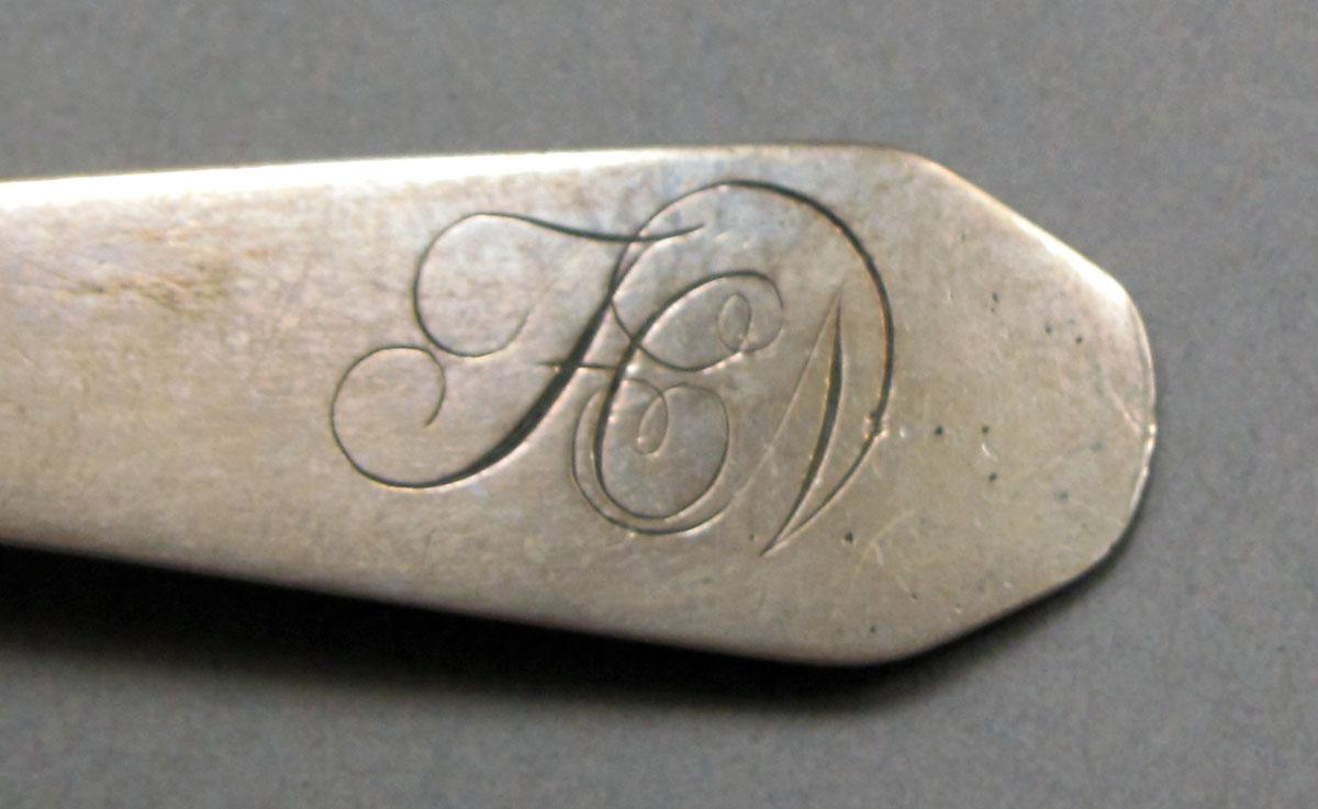 1962.0240.231 Silver spoon engraving