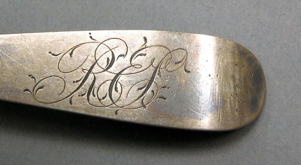 1962.0240.232 Silver spoon engraving