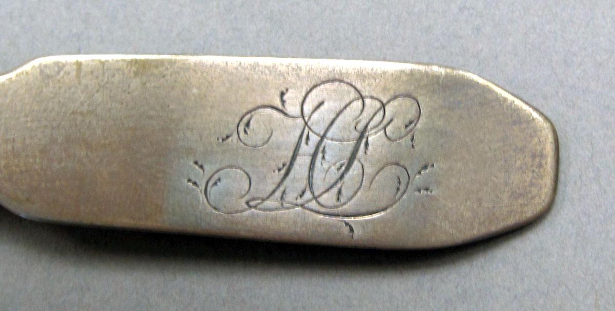 1962.0240.234 Silver spoon engraving