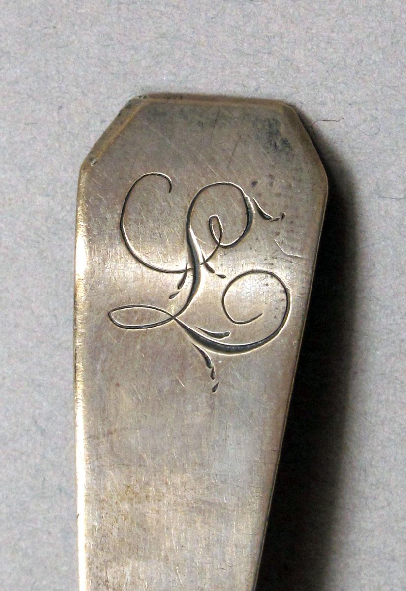 1962.0240.236 Silver spoon engraving